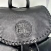 Mochila de piel con tela