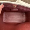 Tote mediana con cartera y charm